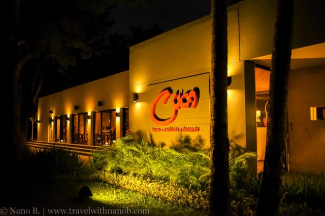 Illuminated cocktail bar at Cuca Restaurant, perfect for upscale evening events.