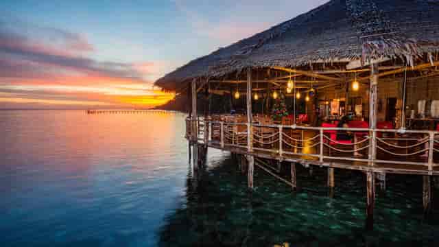 Waterfront dining area at Stay Raja Ampat, ideal for events and meetings.