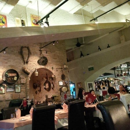 Cozy Ristorante Da Valentino, rustic decor, ideal for corporate events or intimate dinners.