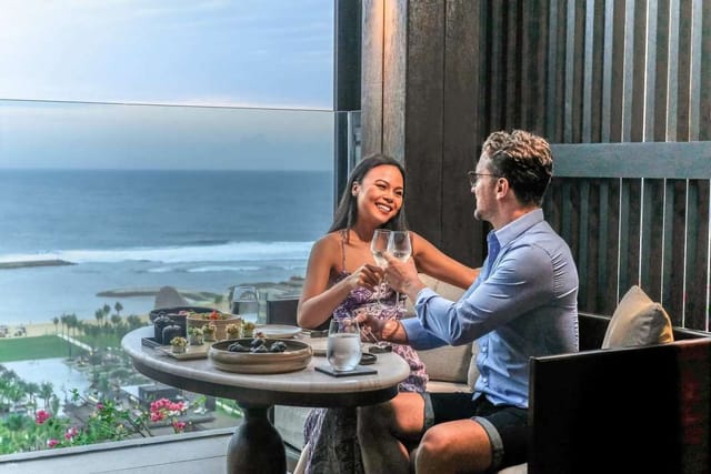 Couple dining at Izakaya Journey, Apurva Kempinski Bali, for luxurious events and romance.