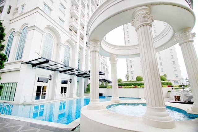 Elegant Albergo Ballroom with pool for upscale events and receptions at The Bellezza Suites.