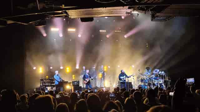 Live music venue at The O2 with atmospheric stage lighting for concerts and corporate events.