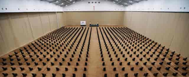Exhibition Hall in ICE, Indonesia: spacious venue with rows of chairs for conferences.