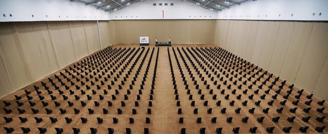Exhibition Hall in ICE, Indonesia: spacious venue with rows of chairs for conferences.