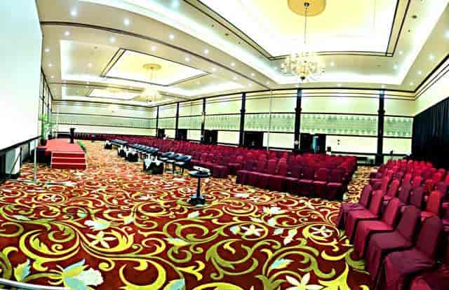 Ballroom at Hotel Grand Cempaka, elegant setup for conferences and seminars.