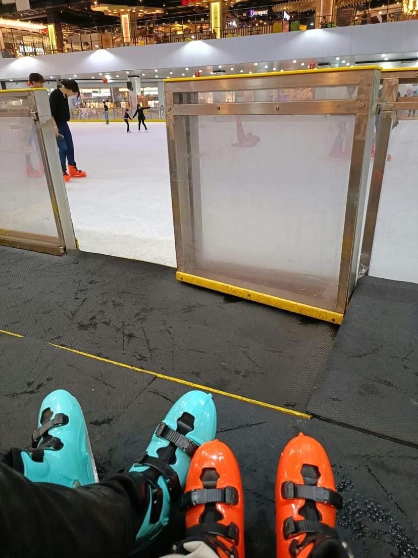 Ice skating rink at Oasis Centre Arena for team-building activities and fun experiences.