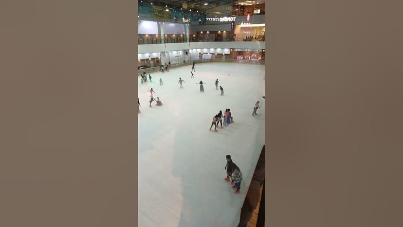 Ice skating rink in Oasis Centre Arena, ideal for corporate events and family gatherings.