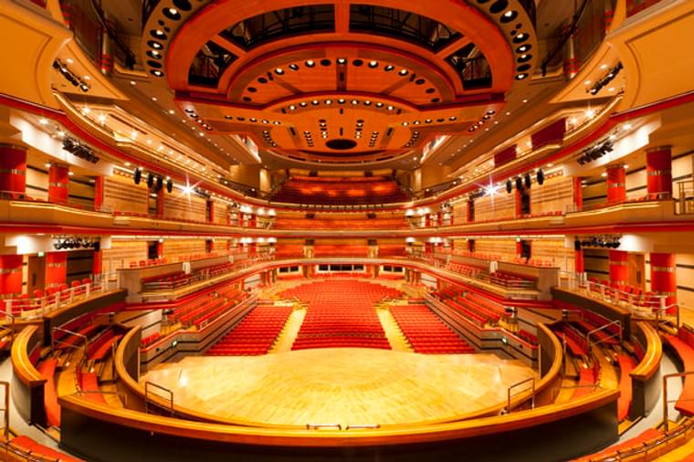 Symphony Hall auditorium with tiered seating, perfect for concerts and conferences. - Banner
