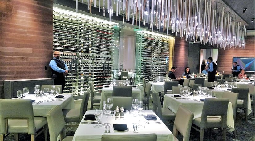 Elegant dining setup at Del Frisco's for corporate dinners and events.