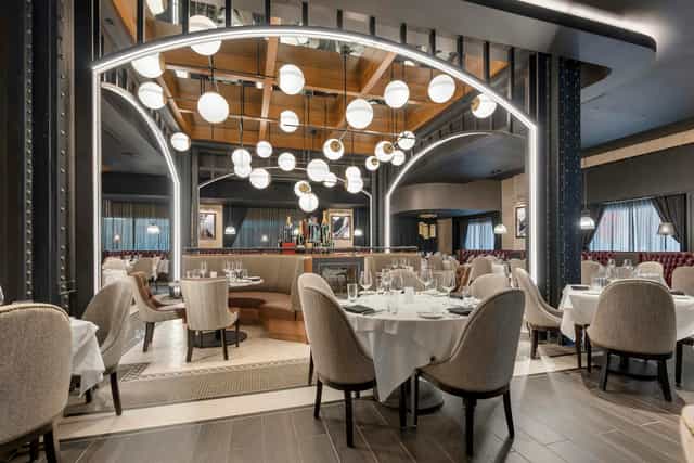 Elegant private dining room at Del Frisco's for upscale meetings and events.