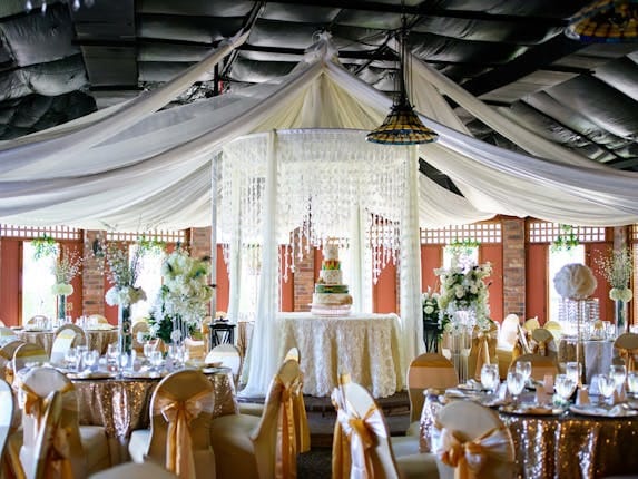 Elegant Quinceanera venue with luxurious lighting and decor at Le Jardin.