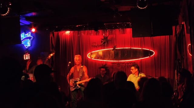 Live music bar at The Continental Club with vibrant stage, perfect for events and entertainment.