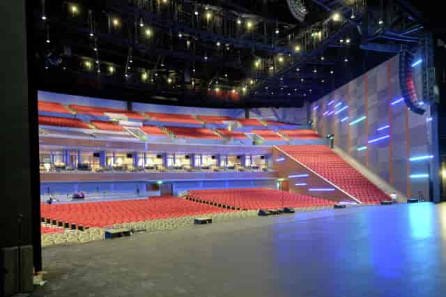 Main Lobby of Smart Financial Centre with tiered seating for events and conferences.