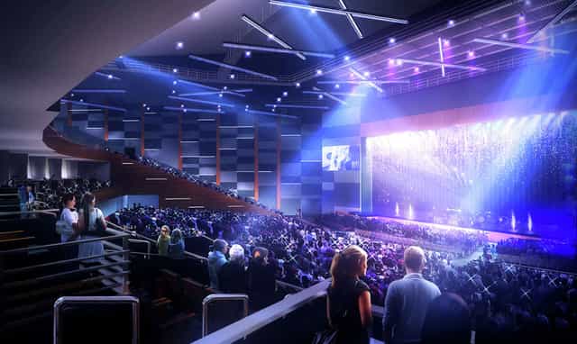 Smart Financial Centre lobby with engaged audience, ideal for performances and conferences.