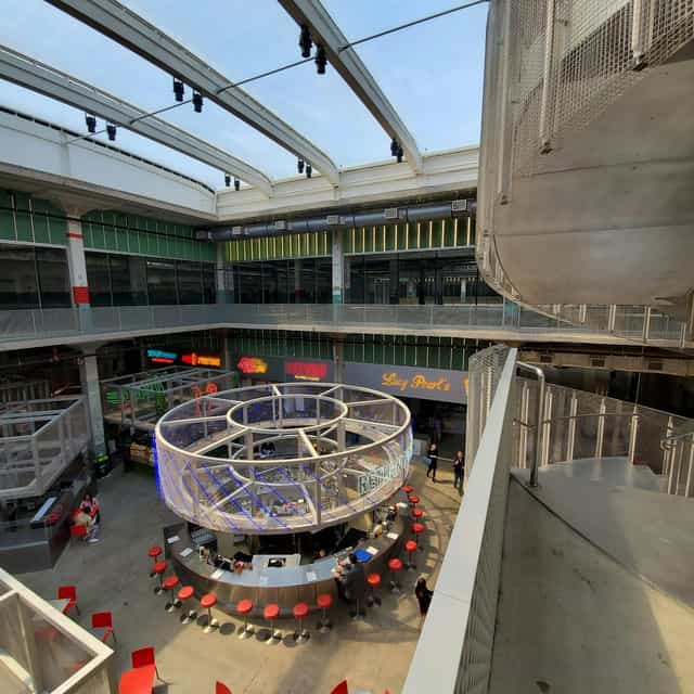 Modern venue with circular seating, perfect for networking events and product launches.
