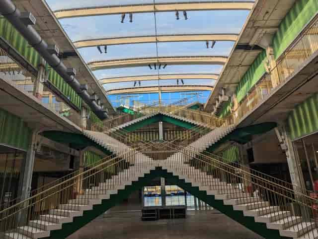 Modern Docks venue with dramatic staircase, perfect for conferences and networking events.