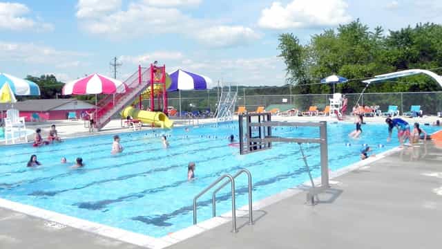 Vibrant outdoor swimming pool in Houston ideal for summer events and family gatherings.