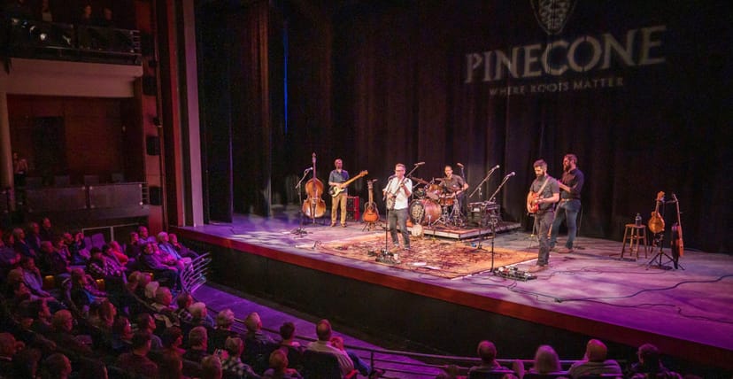 Raleigh Memorial Auditorium stage performance with professional lighting, ideal for concerts.