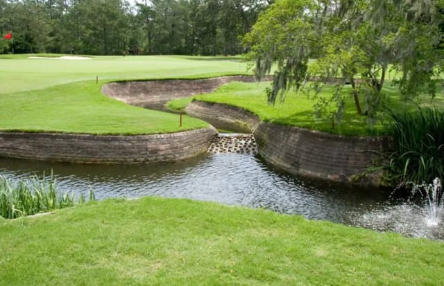 Cypress Bar outdoor venue at Champions Golf Club, ideal for corporate retreats and weddings.