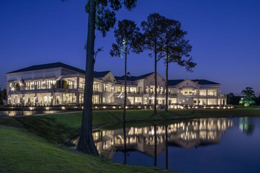 Elegant lakeside luncheon venue with stunning architecture and serene water views.