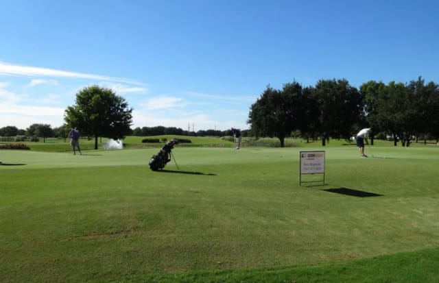 Lush green golf course at Willow Fork Country Club for corporate outings and networking.