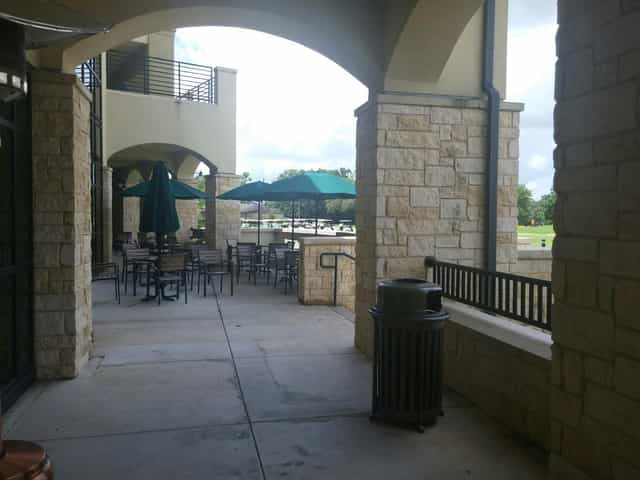 Tee Box Patio at Quail Valley: elegant outdoor terrace for gatherings and networking.