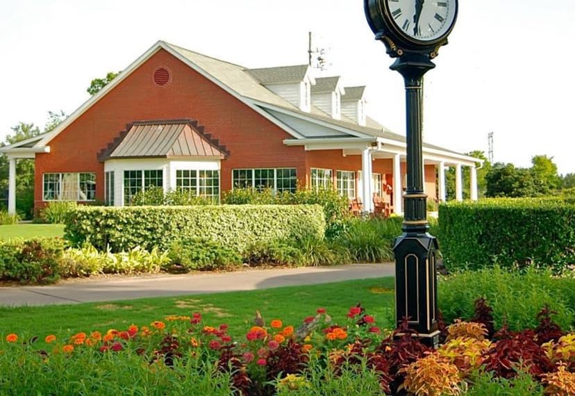 Elegant event space at Sugar Creek Country Club with landscaped gardens, ideal for meetings.