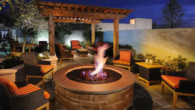Outdoor lounge with fire pit at The View Ballroom, Houston Marriott - ideal for networking events.