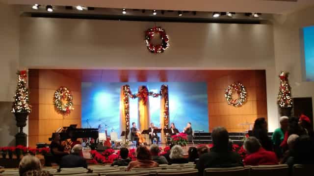 Tower of Light in Unity of Houston, festive gathering setup with decorations for events.