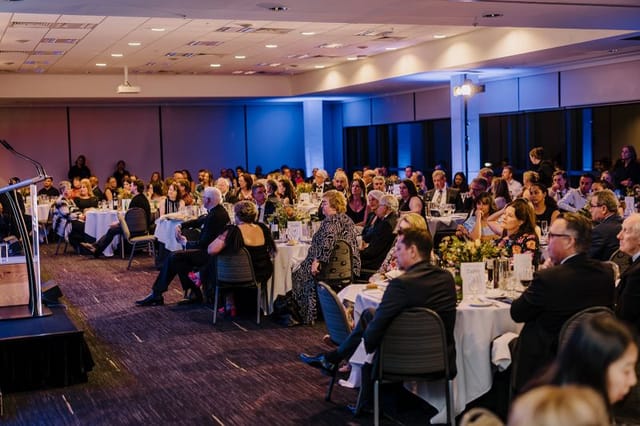 Elegant formal event at Aspire Events Centre with engaged audience and good acoustics.