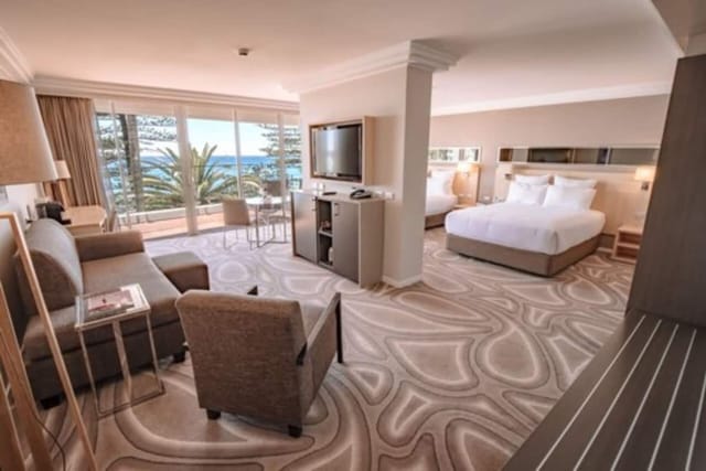 Ocean Room in Aspire Events, spacious suite with natural light, ideal for corporate retreats.