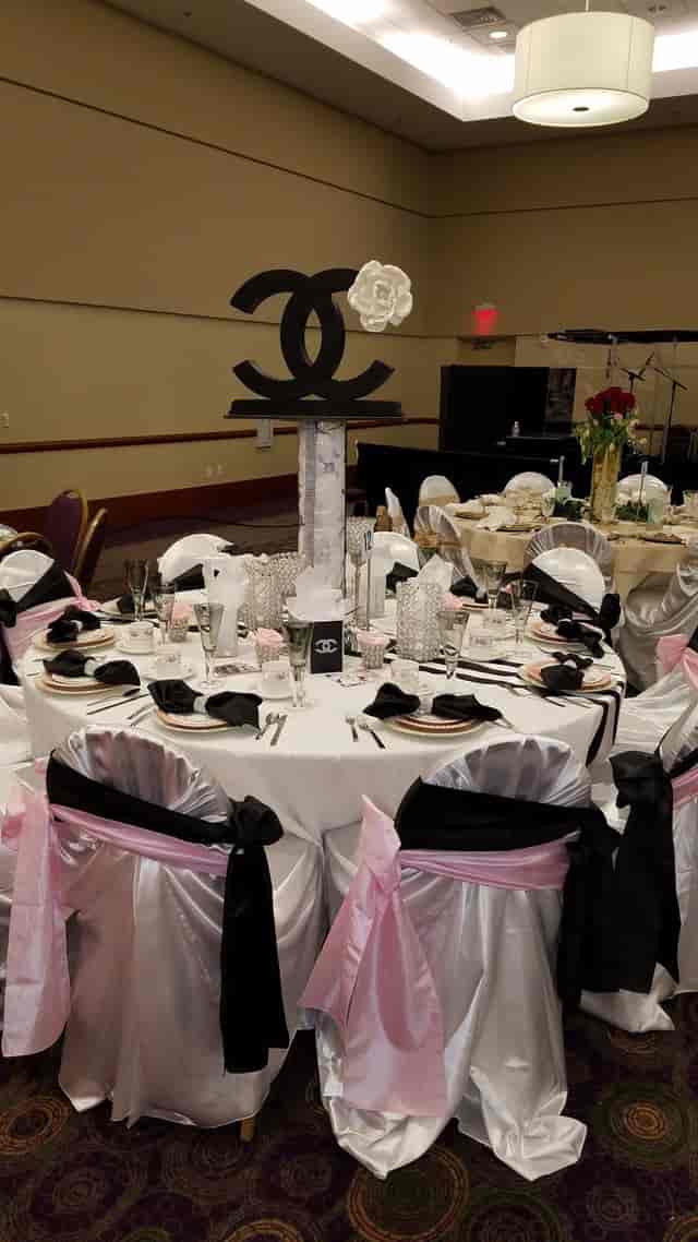 Elegant banquet table at KBC Houston conference center for formal events.