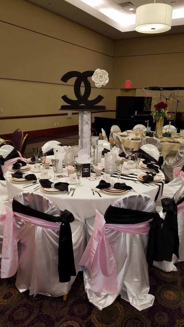 Elegant banquet table at KBC Houston conference center for formal events.
