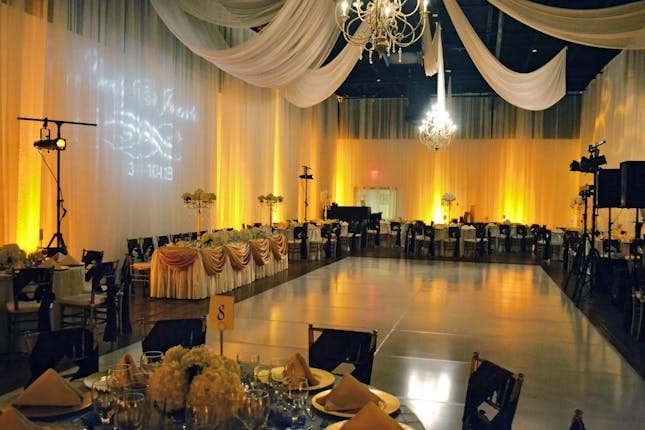 Elegant Grande Ballroom in Houston, featuring a spacious dance floor for weddings and galas.