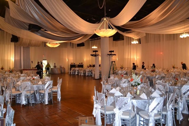 Elegant Grande Ballroom in Houston with floral centerpieces for weddings and galas.