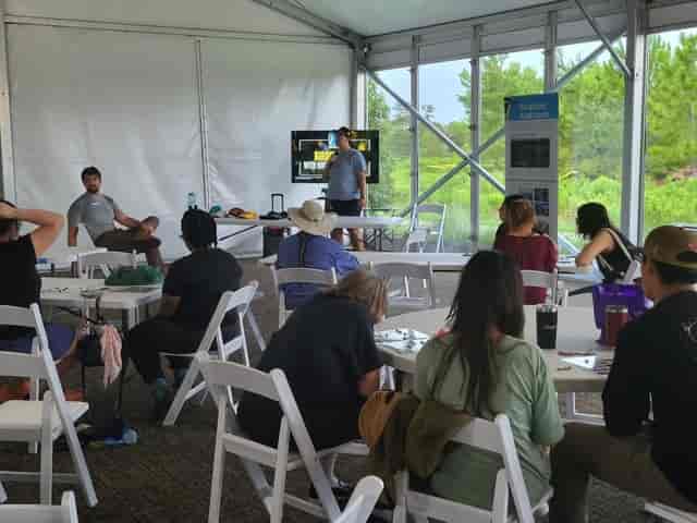 Community Outreach event at Houston Audubon with engaging presentation and natural light.