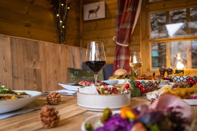 Cozy dining setup with gourmet dishes at Shacks - Elite Pubs for intimate events.