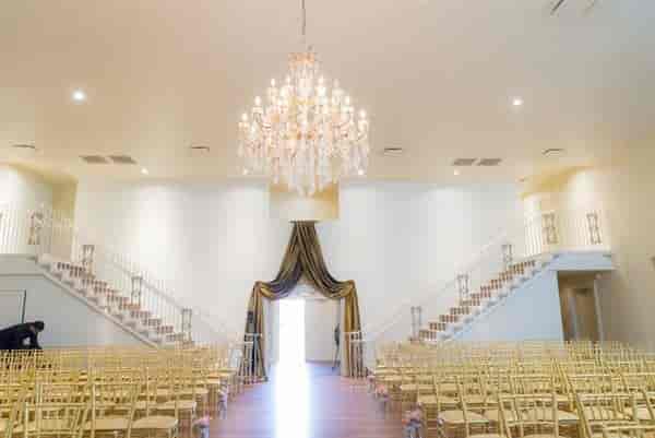 Elegant chandelier in Dallas Palms Venue, perfect for weddings and upscale events.