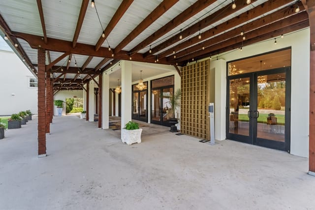 Bel Air Ballroom entrance with string lights, perfect for events and receptions in Dallas.