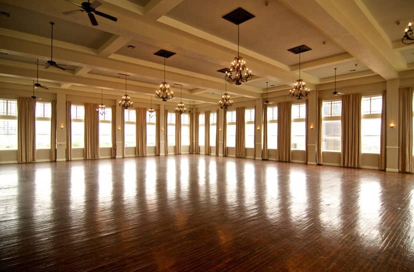 Main Ballroom at The Room on Main, spacious venue with large windows for events.