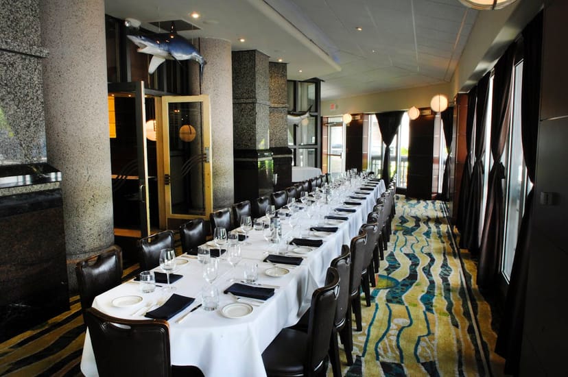 Elegant dining setup in Scollay Square Room for corporate events and networking.