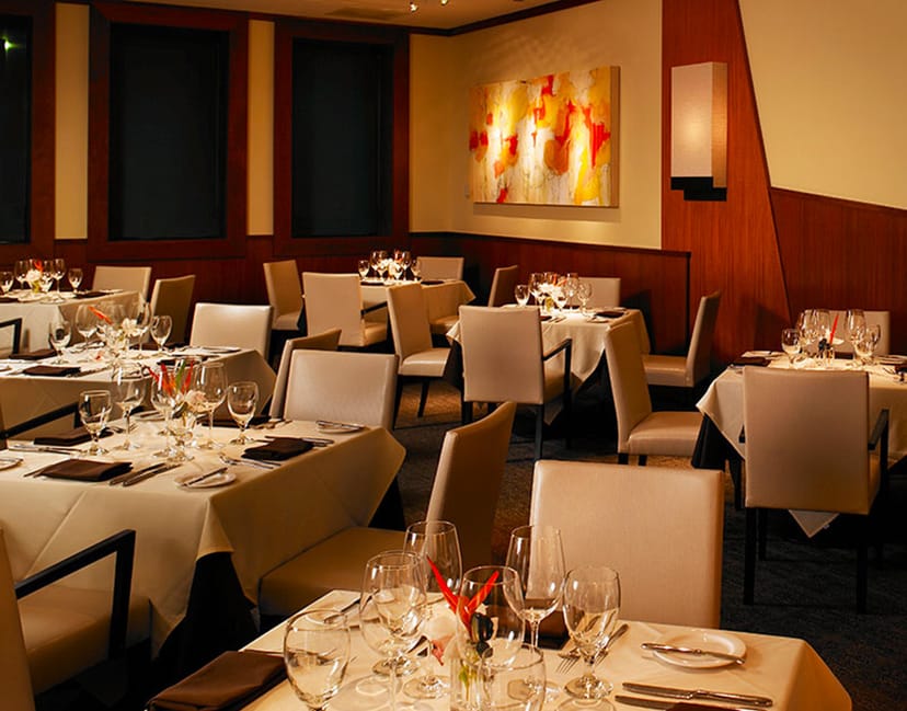 Elegant private dining room at Abacus for intimate gatherings and corporate dinners.