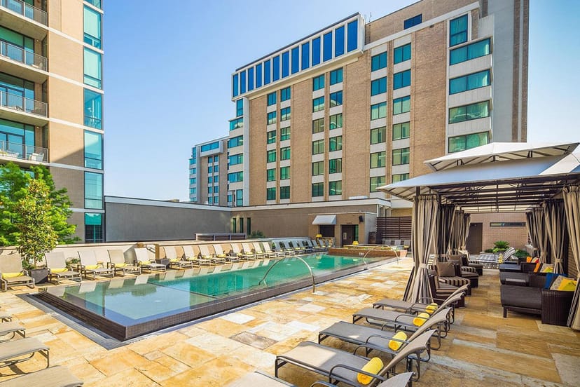 Outdoor infinity pool at The Highland Dallas, ideal for events and networking.