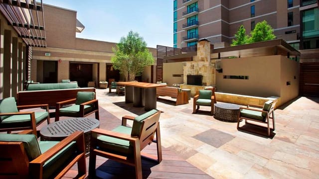 Stylish outdoor patio at The Highland Dallas, ideal for networking events and cocktail receptions.
