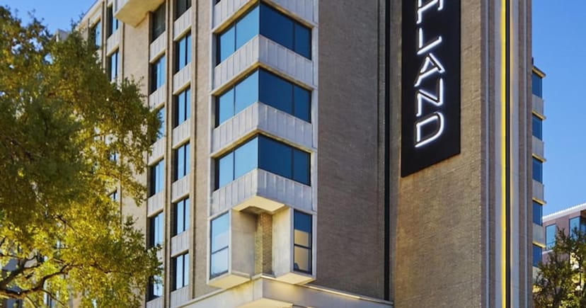 Impressionist Boardroom, modern hotel exterior, ideal for meetings and events.