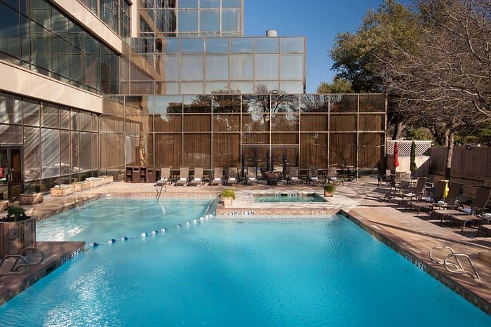 Outdoor pool area at Renaissance Dallas Hotel, perfect for networking events and relaxation.
