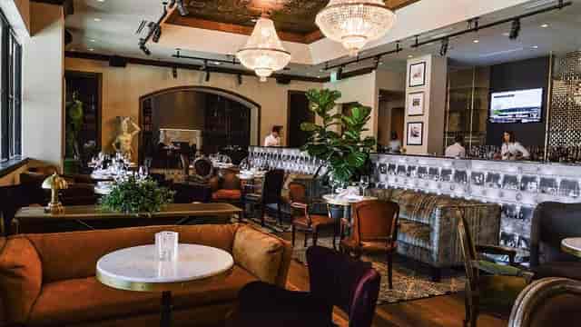Elegant event space at Hotel ZaZa with plush seating for gatherings and networking.
