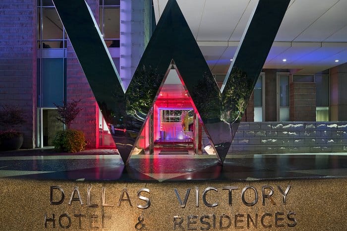 W Dallas entrance, modern architecture ideal for corporate events and social gatherings.