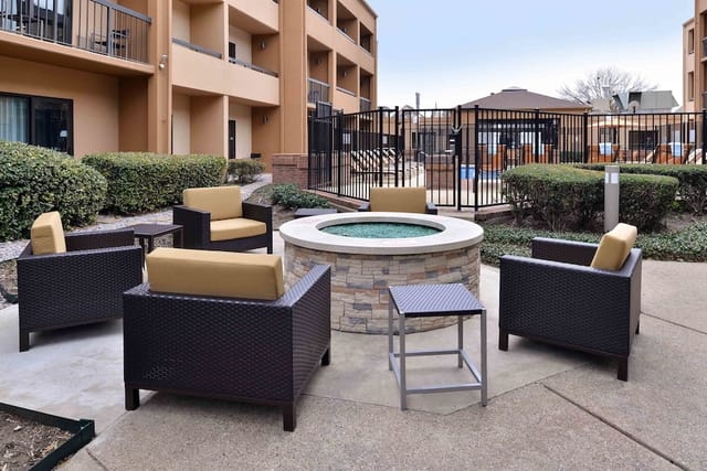 Cozy outdoor seating with fire pit at Residence Inn Dallas for casual gatherings.