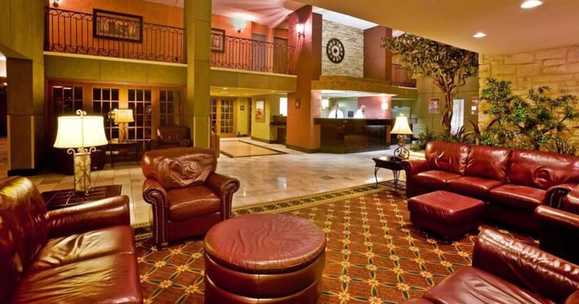 Richardson Ballroom at Holiday Inn Dallas, spacious lobby with warm lighting for events.